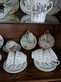 Assorted Floral China Teacups, Saucers, Sugar Bowl, and Creamer - thumbnail 3 of 10