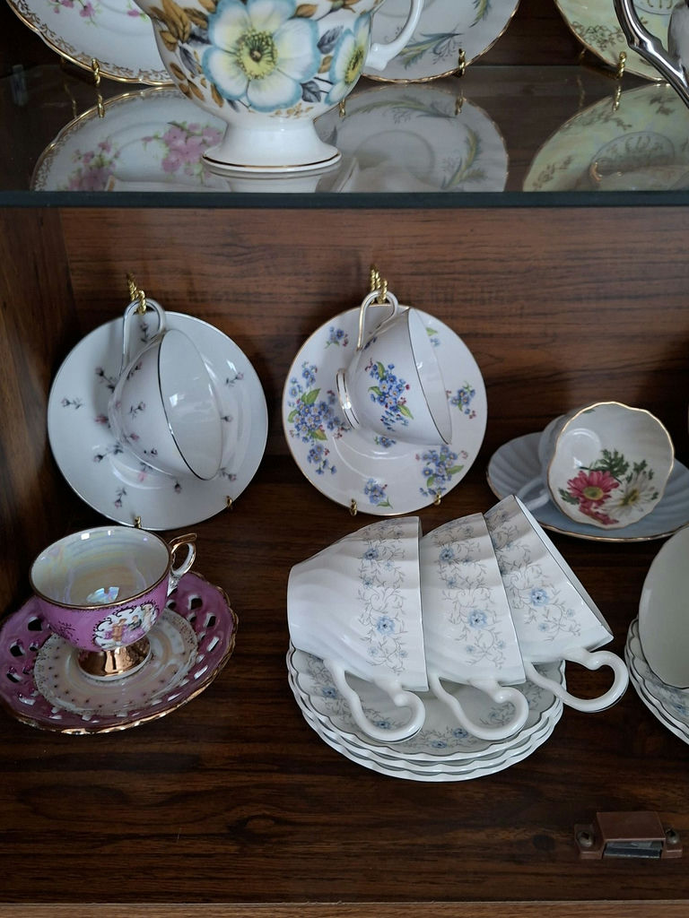 Assorted Floral China Teacups, Saucers, Sugar Bowl, and Creamer - image 2 of 10