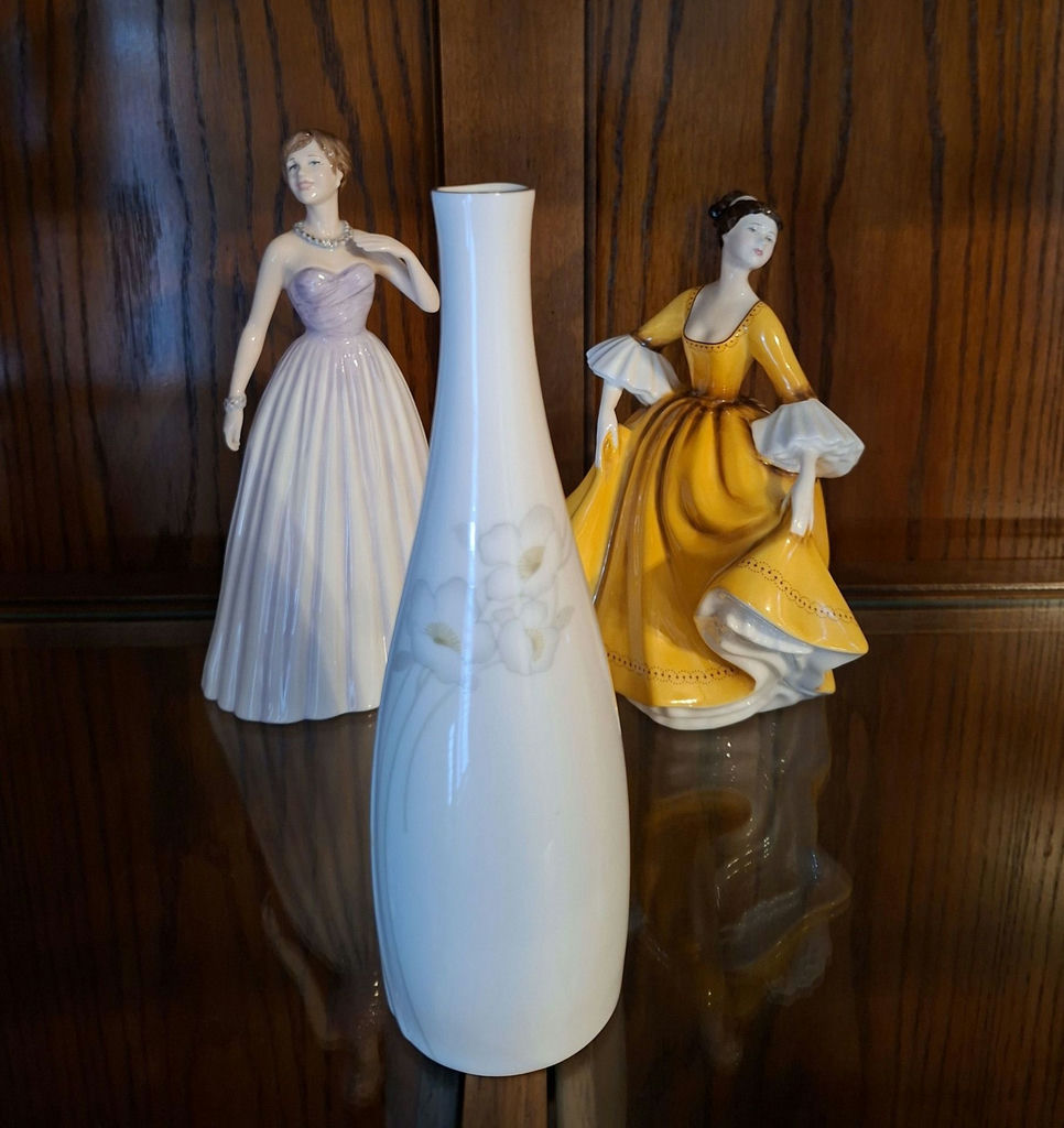 Vintage Royal Doulton Porcelain Figurines and White Floral Vase - image 1 of 9