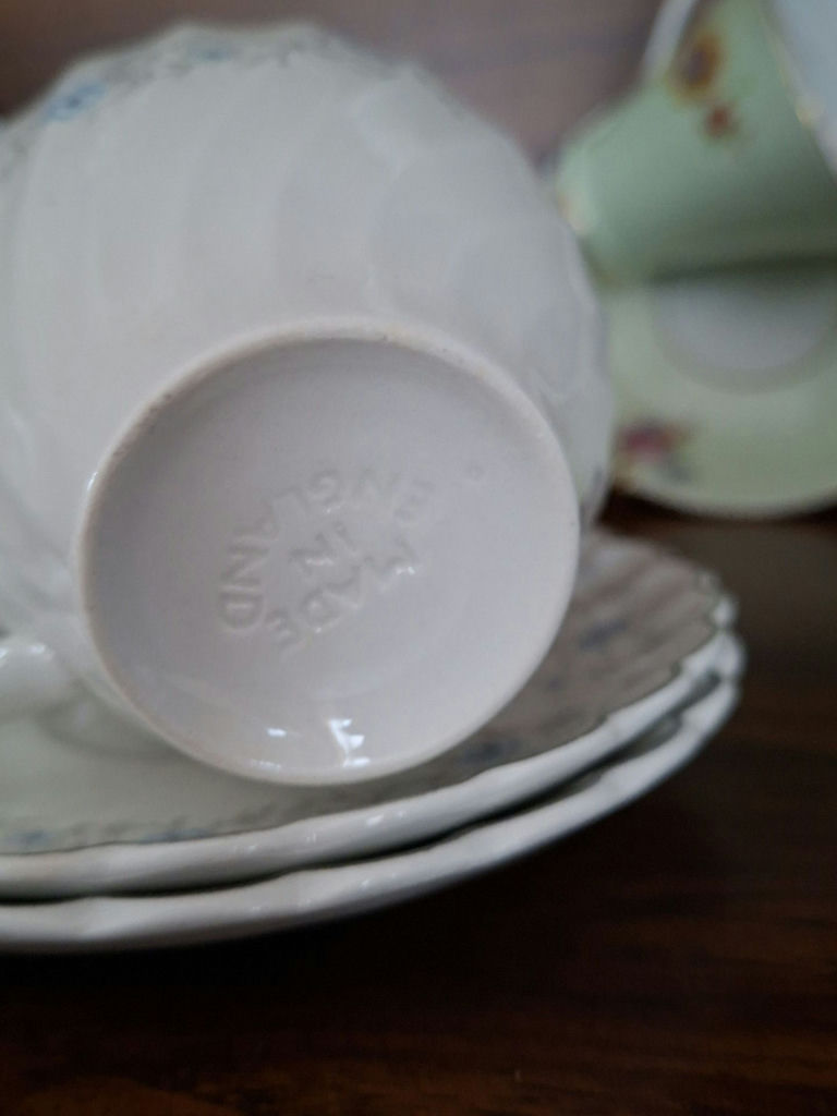Assorted Floral China Teacups, Saucers, Sugar Bowl, and Creamer - image 7 of 10