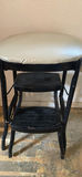 Padded black metal two-tier step stool and wooden chair with a woven seat - thumbnail 2 of 8