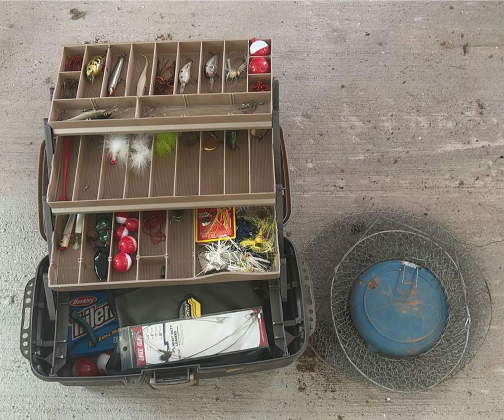 Fishing tackle box with lures and fishing rods - image 1 of 13