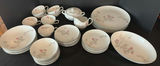 Porcelain dinnerware set with pink floral bamboo motif - thumbnail 1 of 9