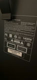 Insignia flat-screen TV with built-in DVD player on wooden dresser - thumbnail 2 of 5