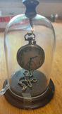 Antique pocket watch under glass dome - thumbnail 2 of 3
