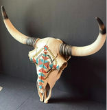 Decorative Native American-inspired skulls, wolf-themed wall art, dreamcatchers, and beaded tomahawk - thumbnail 3 of 8