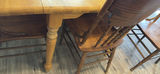 Wooden dining table with carved-back chairs - thumbnail 2 of 4