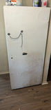 White upright refrigerator with assorted stored items - thumbnail 1 of 4