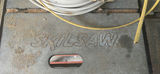 SkilSaw table saw on red work stand with coiled cables - thumbnail 2 of 6