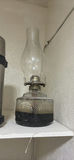 Assorted vintage metal kitchen containers, thermoses, and an oil lamp - thumbnail 8 of 9