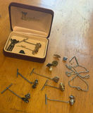 Assorted cufflinks, tie bars and jewelry pieces in a Lyntone box - thumbnail 1 of 6