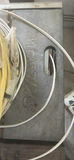 SkilSaw table saw on red work stand with coiled cables - thumbnail 6 of 6