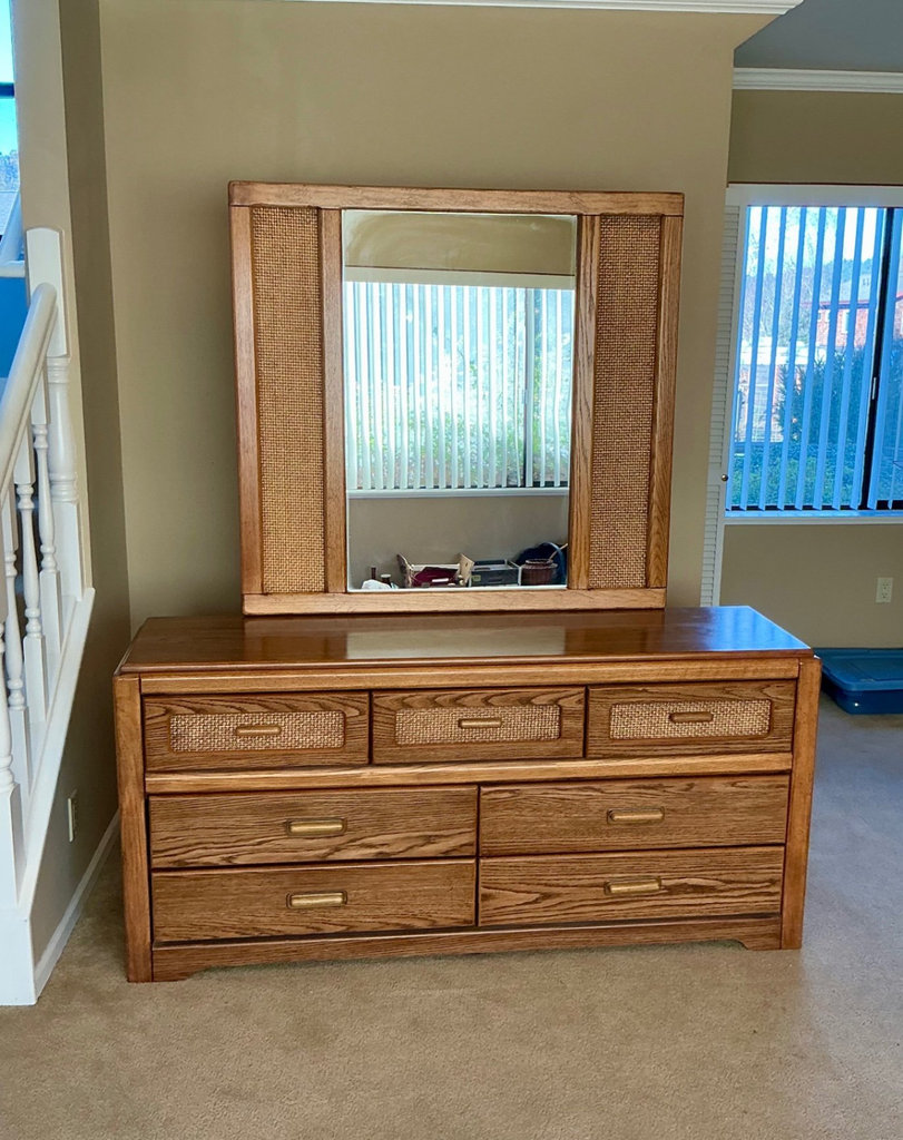 Vanity dresser with attached mirror and caned panels - image 1 of 7