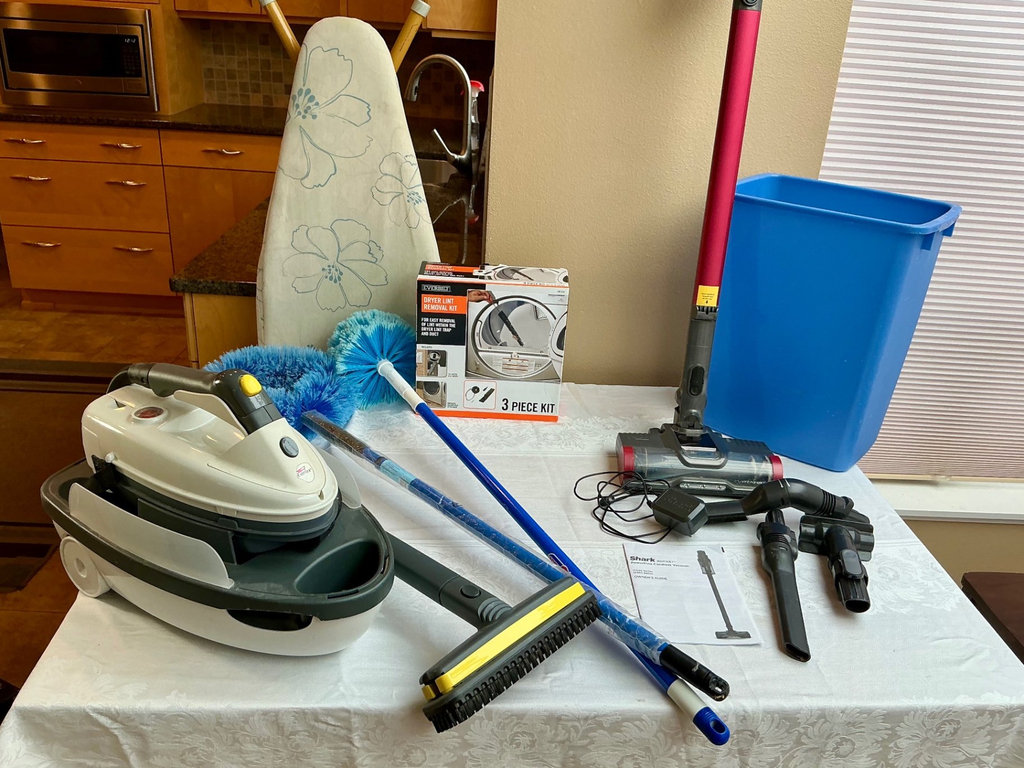 Cordless vacuum with attachments and cleaning tools - image 1 of 5