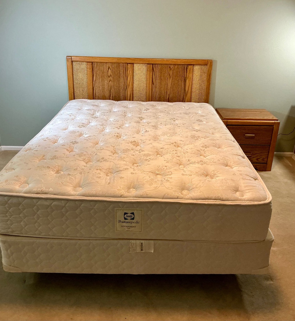 Wooden bed frame with queen mattress and matching nightstand - image 1 of 6