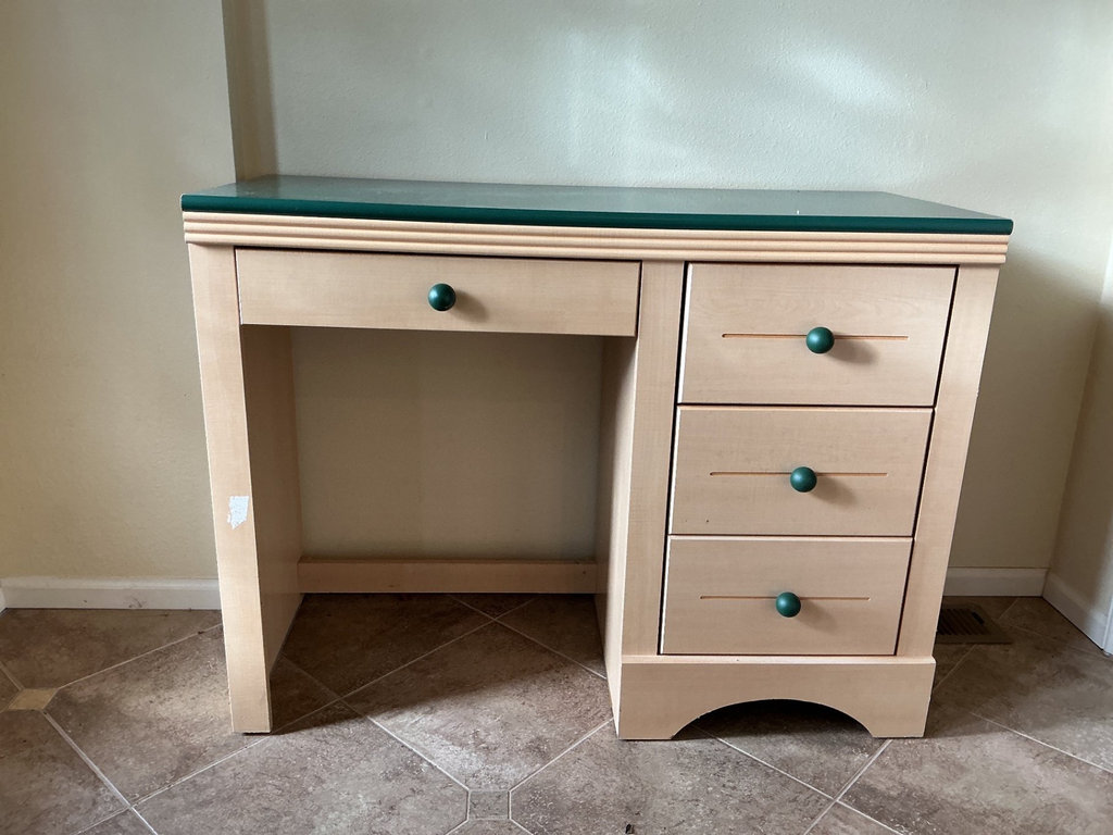 Wood desk with painted green top and multi-drawer storage. - image 1 of 5