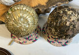 Rustic wooden items, petrified wood, woven spheres, and bead display - thumbnail 3 of 9