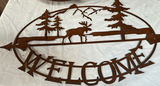 Rustic metal ceiling light and circular welcome sign with deer and trees - thumbnail 2 of 4