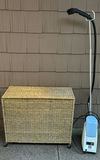Wicker three-compartment laundry hamper with a portable garment steamer - thumbnail 1 of 4