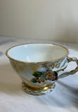Goebel porcelain figurines with floral vases and dishes - thumbnail 6 of 16