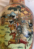 Assorted Asian decorative ceramics: vase, plates, and dish - thumbnail 10 of 11