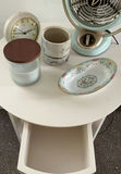 White round end table with vintage fan and assorted decorative items - thumbnail 4 of 6