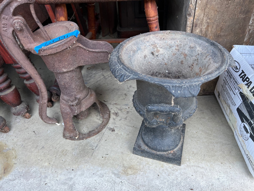 Rusty antique metal water pump and urn  - image 1 of 6