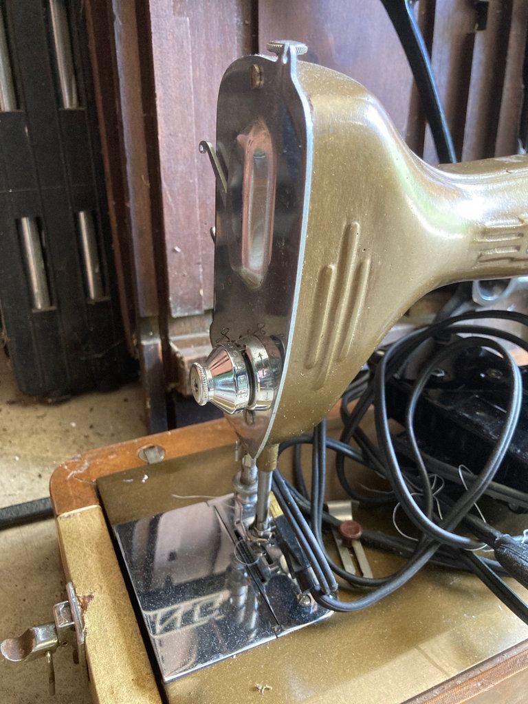 Vintage New Home sewing machine with Singer frame and accessories - image 8 of 8