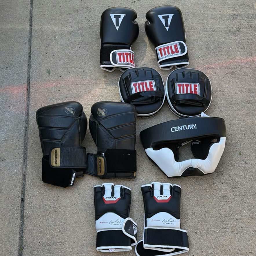 Boxing gloves, headgear, and protective pads - image 2 of 6