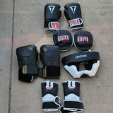 Boxing gloves, headgear, and protective pads - thumbnail 2 of 6