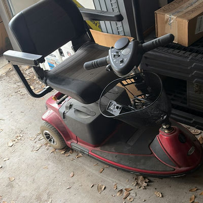 Red REVO Mobility Scooter with Front Basket - Image 1 of 4