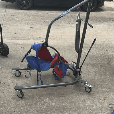 Medline floor-based patient lift with slings - Image 1 of 5