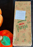 Assorted Halloween decor: plush pumpkins, cow-patterned cushion, and vintage candle box - thumbnail 4 of 6