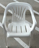 White Plastic Armchair and Wooden Woven-Seat Chair - thumbnail 1 of 7