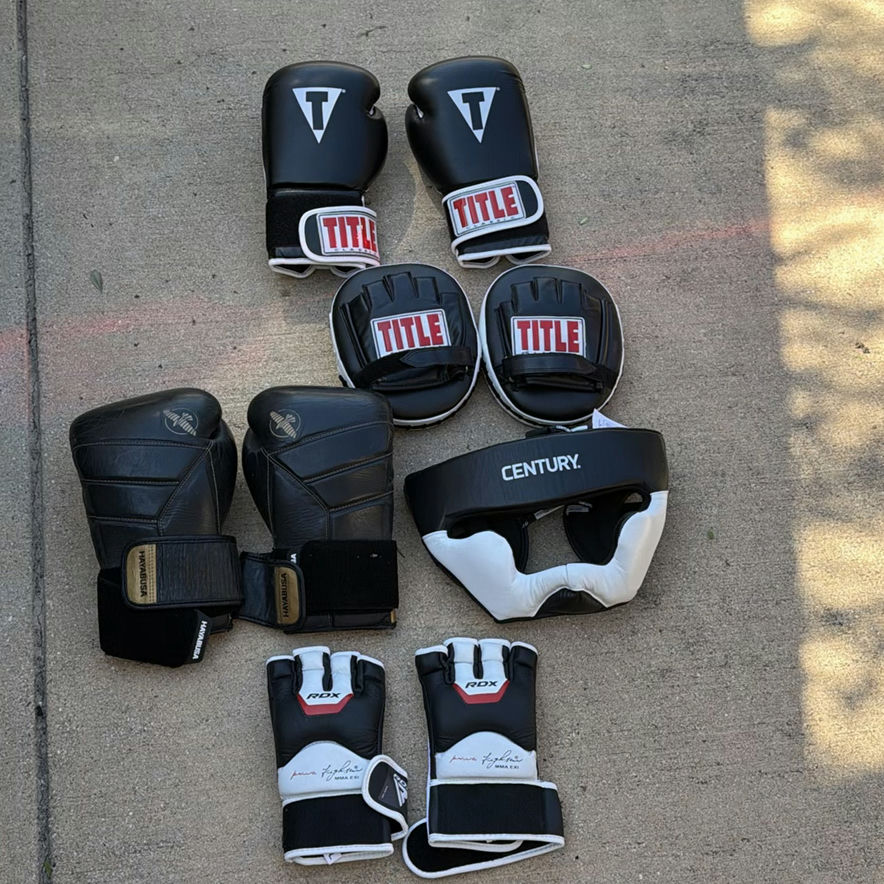 Boxing gloves, headgear, and protective pads - image 1 of 6