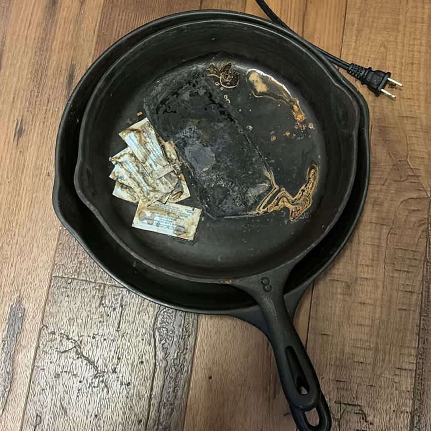 Red covered saucepan with glass lid and assorted cookware - image 2 of 3