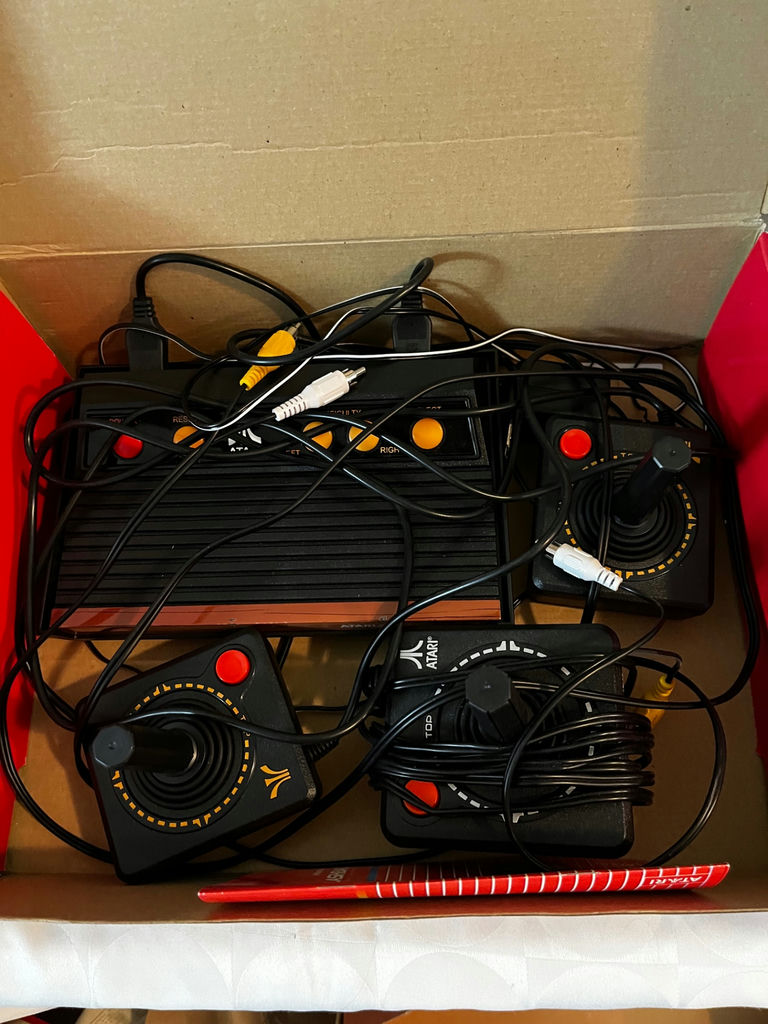 Atari Flashback 2 game console with two joysticks and cables - image 1 of 2