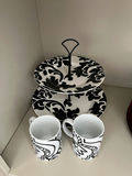 Two-tier serving stand with black-and-white damask plates and matching mugs, plus stack of decorative plates - thumbnail 3 of 3