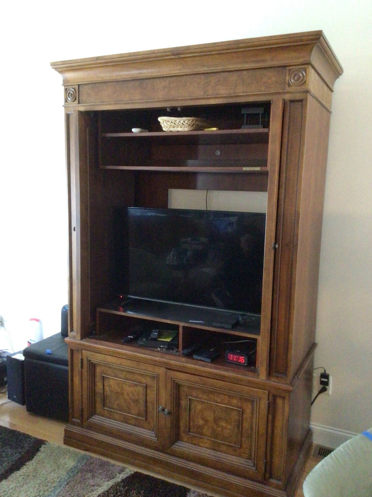 Large wooden entertainment center - image 1 of 2