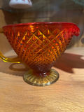 Amber diamond-cut goblet and red ruffled vase - thumbnail 1 of 3