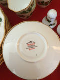 Holly-pattern porcelain dinnerware set with gold trim - thumbnail 5 of 5