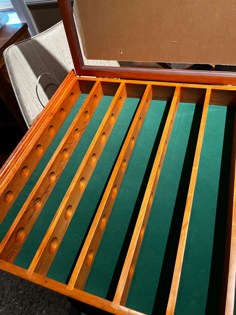 Wooden golf ball rack with glass doors and golf-themed accessories - image 1 of 4