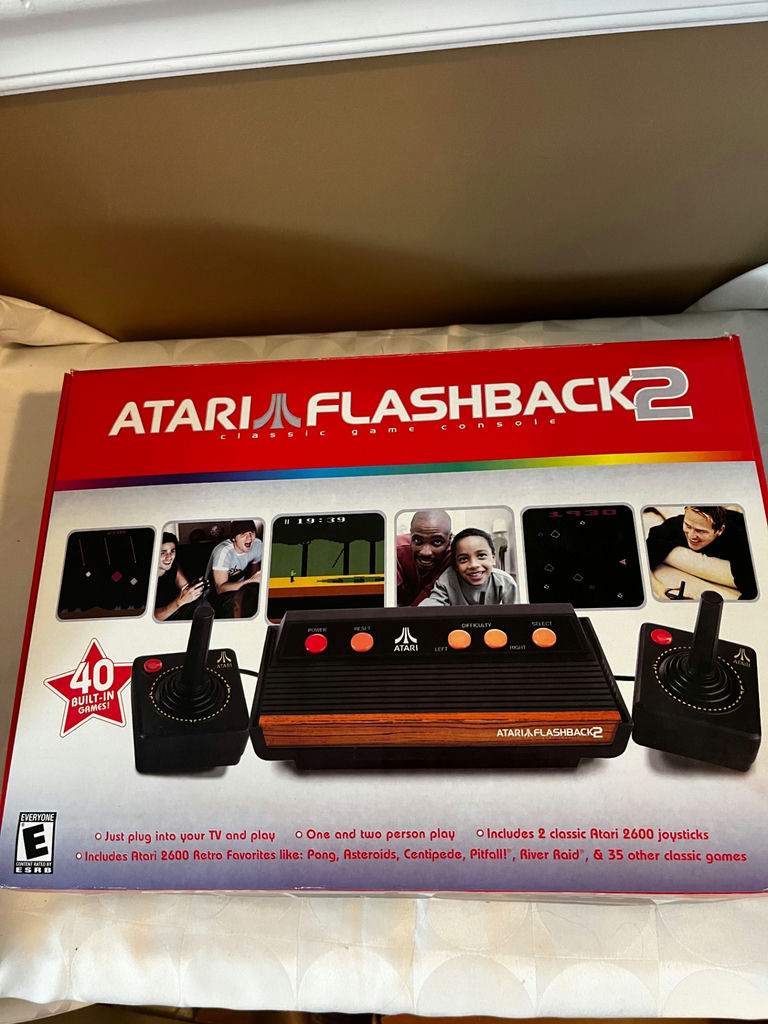 Atari Flashback 2 game console with two joysticks and cables - image 2 of 2