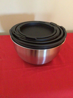 Stainless steel nesting bowls with silicone lids - Image 1 of 2