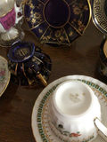 Assorted porcelain tea cups, teapots, and plates - thumbnail 8 of 13