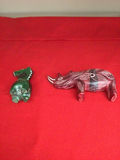 Green carved canine figurine and red leaf-patterned boar figurine - thumbnail 2 of 2