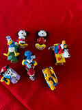 Disney character mini figurines on toy vehicles - thumbnail 1 of 2