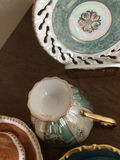 Assorted porcelain tea cups, teapots, and plates - thumbnail 13 of 13