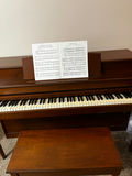 Janssen Upright Piano with Bench and Sheet Music - thumbnail 1 of 2