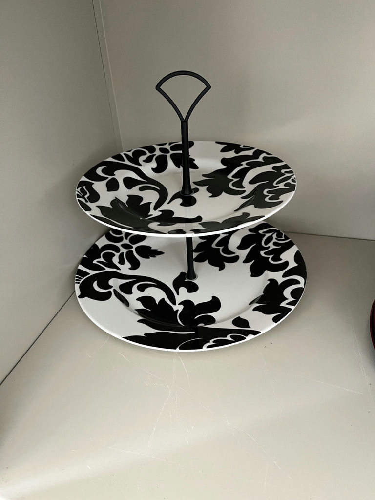 Two-tier serving stand with black-and-white damask plates and matching mugs, plus stack of decorative plates - image 2 of 3